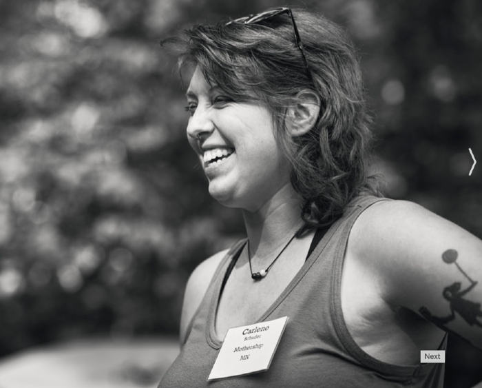 Carlene of Impossible Coffee is smiling at an event as she can repair espresso machines, coffee brewers, and grinders